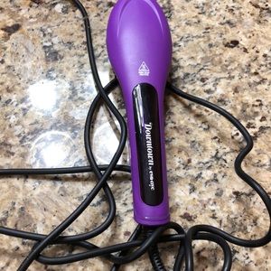 Heated hair straightener brush.